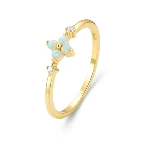 Elegant S925 sterling silver opal flower ring with gold finish and clover design
