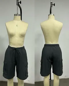 Front and back views of charcoal grey women's cargo shorts with drawstring.