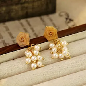 Elegant yellow rose stud earrings with hanging faux pearl cluster tassels in vintage style