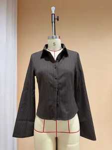 Detailed front view of a French retro slim-fit cotton pinstripe long-sleeve shirt on a mannequin.