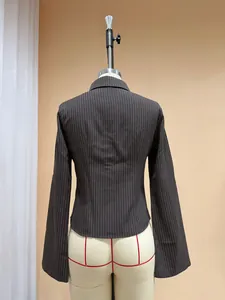 Back view of a French vintage slim-fit long-sleeve cotton pinstripe shirt for women
