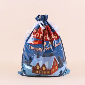 Festive blue Christmas drawstring gift bag featuring a snowy house and holiday greetings