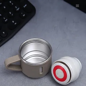Portable 304 stainless steel vacuum flask with dual-use lid that doubles as a cup