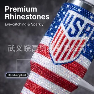 Macro detail of hand-applied premium rhinestones on a 40oz US flag pattern tumbler cup