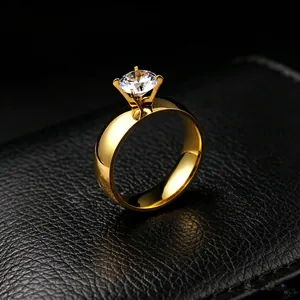 Close-up detail of a 6mm clear zircon stone on a polished 316L gold titanium ring.