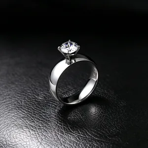 Elegant 316L stainless steel ring with a 6mm solitaire zircon set on black leather.