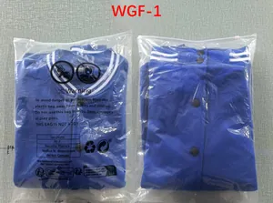 Detailed view of blue American style baseball jackets inside clear plastic packaging bags