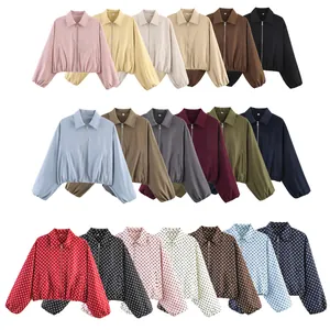 Showcase of various colors and patterns for women's zip-up baseball jackets with puffed hems.