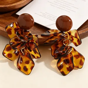 Exquisite detail of brown leopard print petal tassel earrings in high-end Maillard style