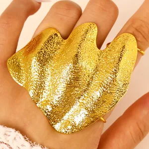 Artistic irregular wrinkled gold joint ring with textured finish for a high-end look