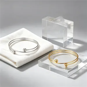 Minimalist stainless steel double-layer bangle with spherical bead accents for couples