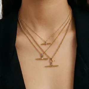 Layered T-bar gold necklaces in stainless steel for women, high-quality detail.