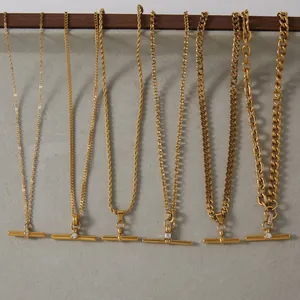 Assorted gold T-bar stainless steel necklaces featuring various elegant chain styles