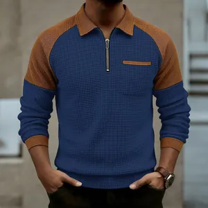 Close-up of men's waffle knit quarter-zip polo shirt with brown raglan sleeves