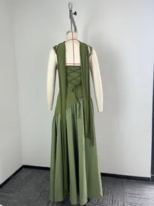 Rear view of olive green maxi dress with lace-up back and long fabric streamers