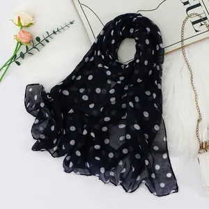 Navy blue voile scarf with classic white polka dot pattern for women.