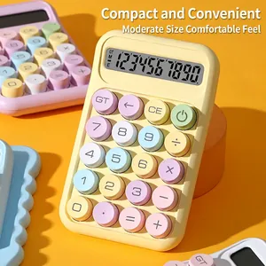 Detail macro view of macaron colored portable calculator with mechanical round buttons
