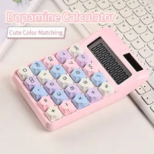 Pink mechanical button calculator with colorful macaron keys for office and study