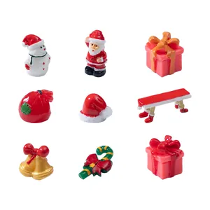 Set of 9 miniature resin Christmas figurines featuring Santa Claus, snowman and gifts