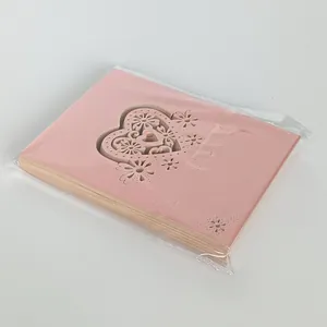 Bulk pack of laser-cut pink heart place cards for wedding banquet and party seating