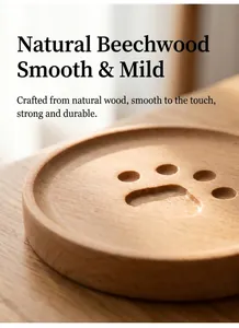 Detailed close-up of a natural beech wood coaster featuring a carved bear paw pattern