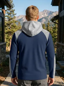 Vue arrière d'un sweat à capuche en maille gaufrée bleu marine avec panneaux gris