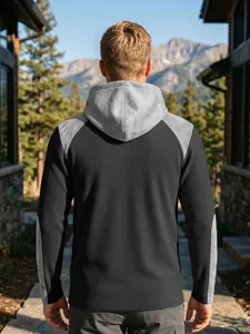 Vue arrière d'un sweat à capuche gaufré pour homme avec design bicolore gris et noir