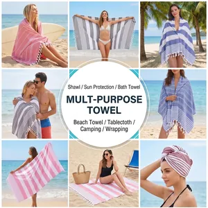 Multipurpose Turkish cotton beach towel with striped patterns and fringed tassels