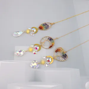 Golden heart tree of life suncatcher with rainbow crystals for window hanging decor.