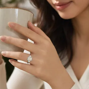 Elegant emerald cut yellow moissanite flower ring in 925 sterling silver on model