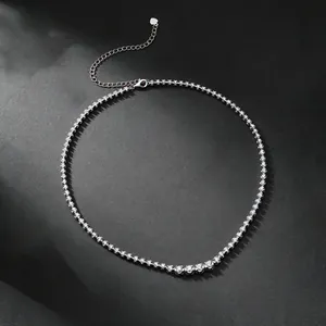 Elegant S925 sterling silver moissanite tennis necklace displayed on textured black background