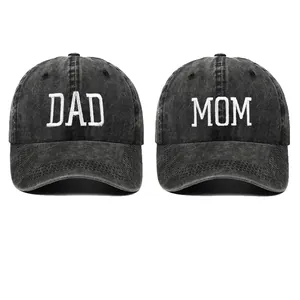 Set of DAD and MOM embroidered washed cotton baseball caps in black for the family.