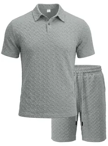 Macro view showing the textured herringbone jacquard fabric of this grey men's Polo set