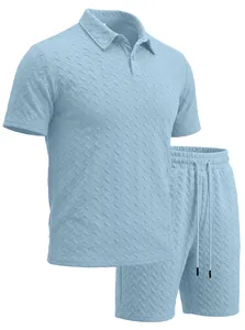 Close-up of light blue men's polo set showing intricate jacquard herringbone texture.