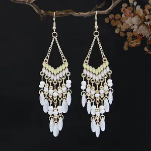 Bohemian ethnic style beaded tassel earrings with white water drop charms