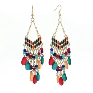 Bohemian ethnic style long dangle earrings with colorful beads and waterdrop tassels on white