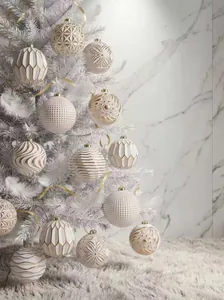 Set of 12 cream and gold Christmas ball ornaments featuring elegant geometric and floral patterns.