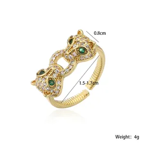 Detailed view of gold-plated double leopard ring with dimensions and weight info