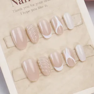 Nude pink and white french oval press-on nails with spiral 3D wave textures for daily wear