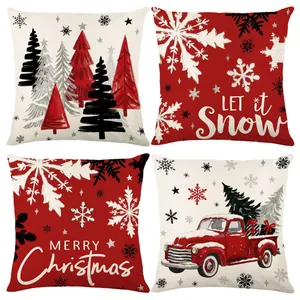 Set of four Christmas themed polyester cushion covers with festive red truck and tree prints