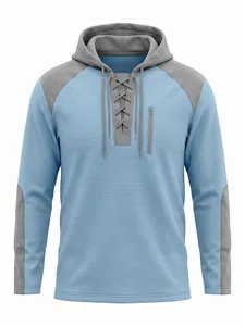 Vue détaillée du sweat à capuche en maille gaufrée avec col lacé et blocs bleus et gris
