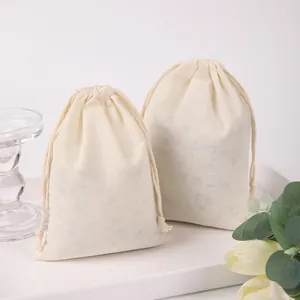 Eco-friendly off-white cotton drawstring gift pouches for jewelry and small item packaging