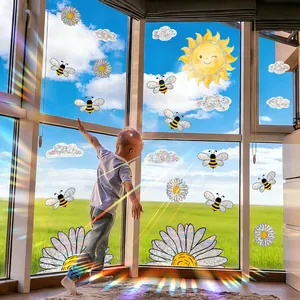 Sunlight prism window decals with daisy and bee designs creating rainbows