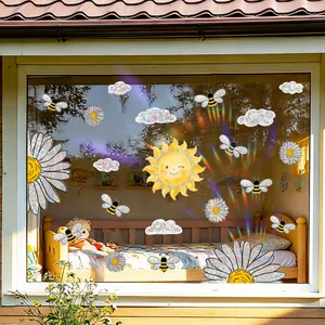 Rainbow daisy and sun holographic window stickers creating colorful prism light effects