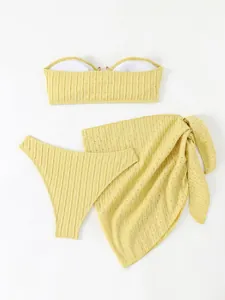Three-piece yellow mesh bikini set with bandeau top, bottom, and matching sarong