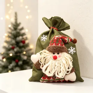 Festive green Christmas Santa Claus drawstring burlap gift bag with 3D plush decoration