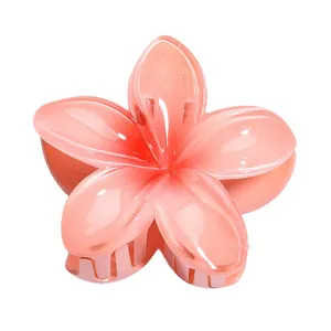 Large translucent peach frangipani flower hair claw clip for thick hair styling