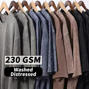Detailed view of various vintage washed 230gsm heavy cotton t-shirts on hangers