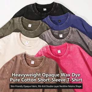 Macro detail of vintage acid-washed 100% cotton T-shirts in various vibrant colors