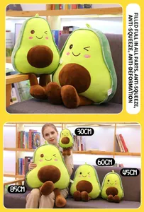 Detailed view of winking avocado plush pillows in sizes thirty to eighty-five cm